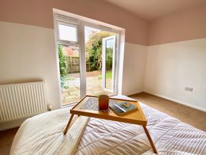 Bedroom One- click for photo gallery